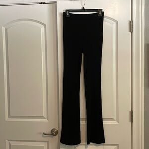 Bundle of 4 stretchy flared pants size small